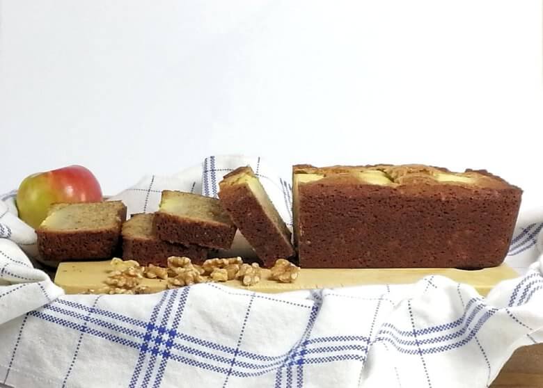 Picture of a sliced Apple Walnut Cake, taken from the side