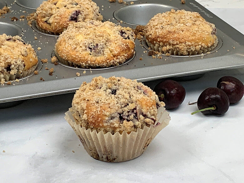 Close-up of cherry muffin with streusel topping