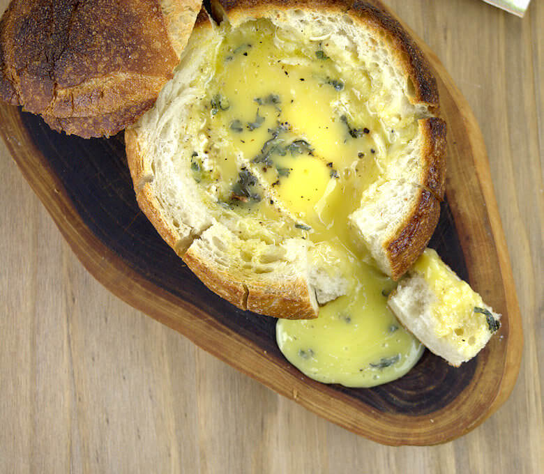 Top down picture of Easy Baked Brie in Bread with Sage