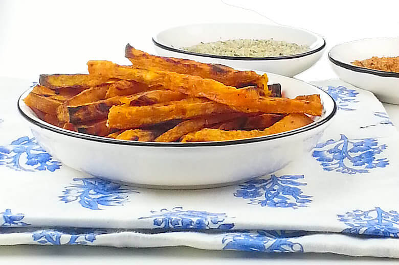 Picture of oven bakes sweet potato fries on napkin