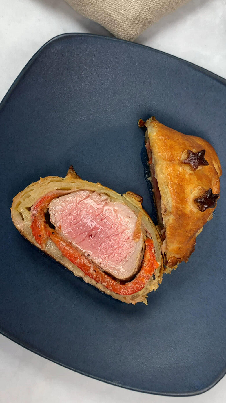 Juice cut of pork Wellington.