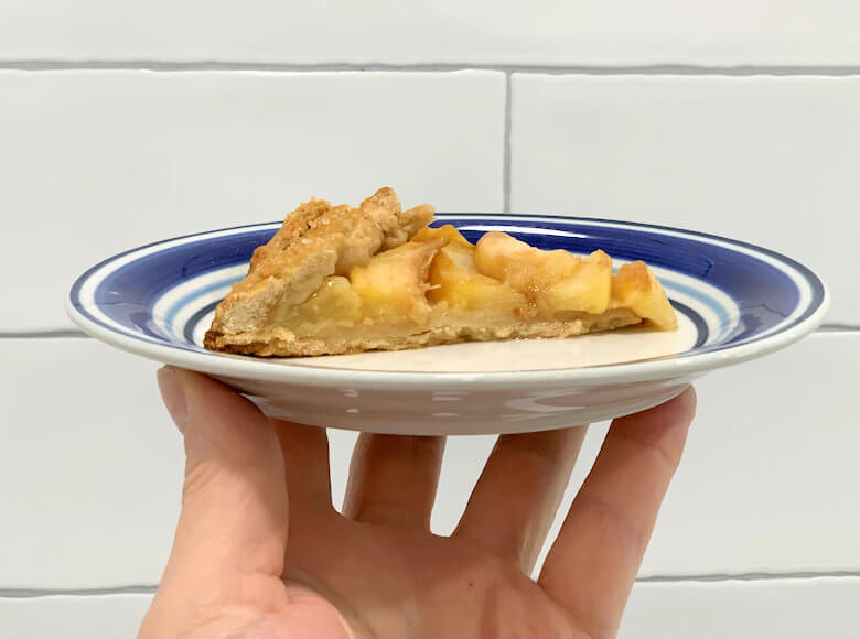 Slice of peach pie